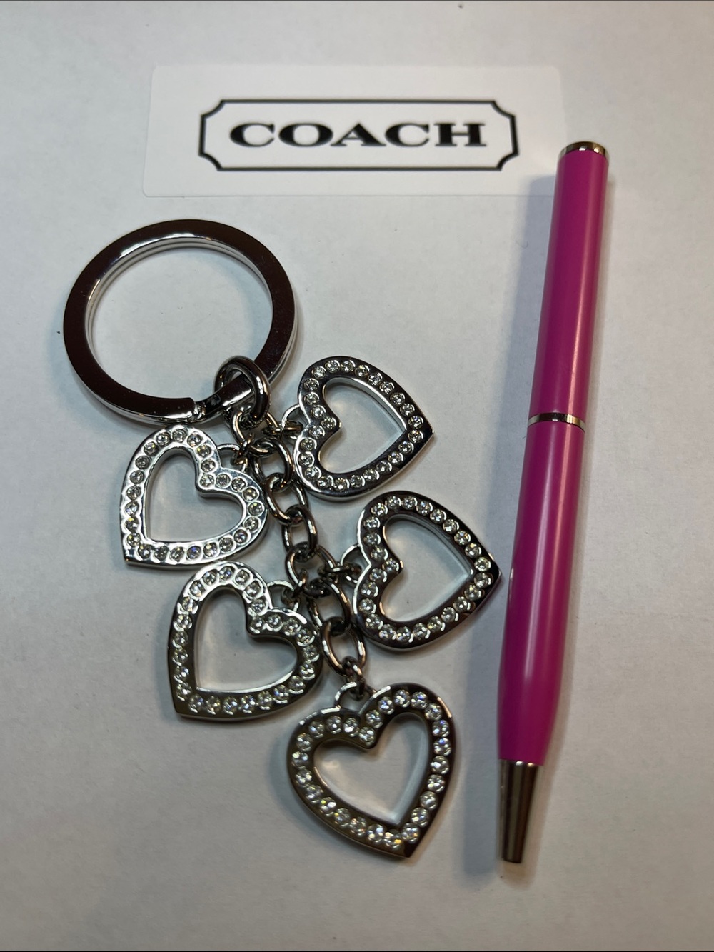 Coach Silver Crystal Heart Charm Keyring with Pink Accent Coach Pen
